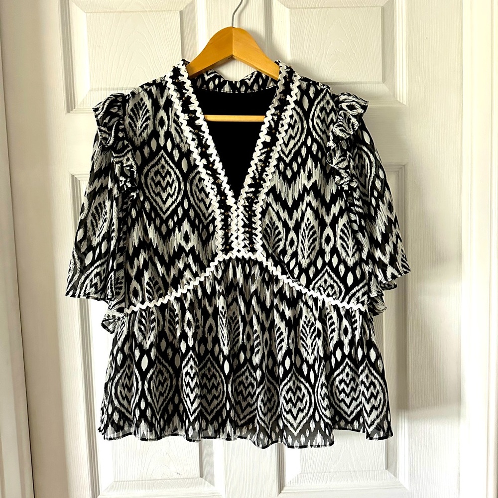 Black and White Ruffled Peplum Blouse with 3/4 Sleeves. Tag removed L/XL Used 1x